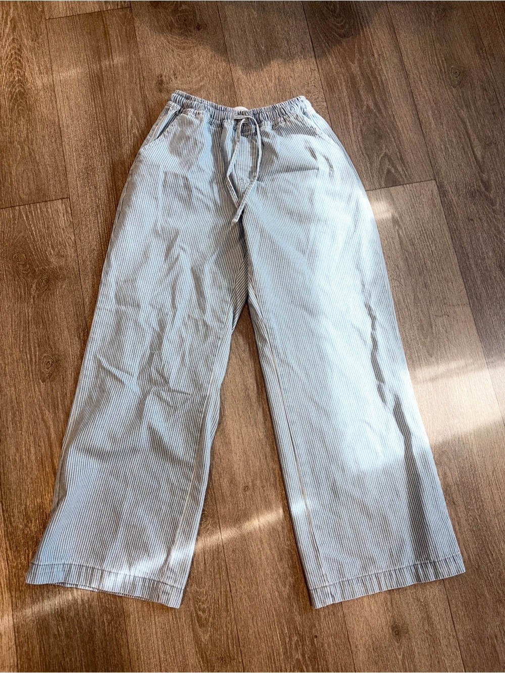 Fashion Nova Light Blue Pinstripe pants .